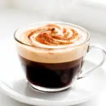 dirty chai latte with cinnamon - featured image